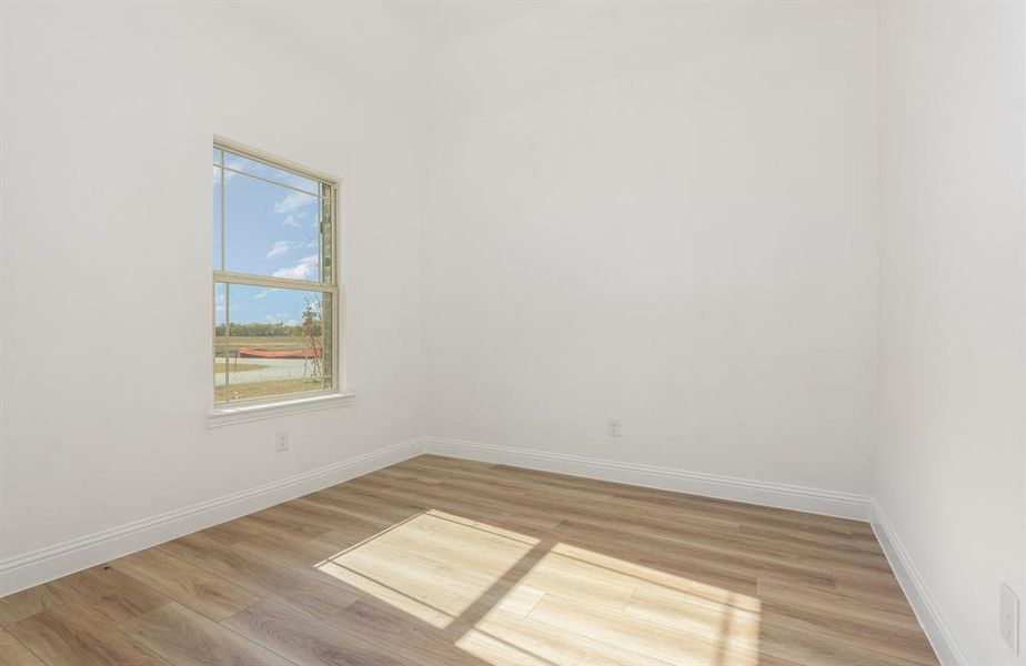 Spacious, unfurnished interior of a new home in Stone Henge II, Sanger (Image 13).