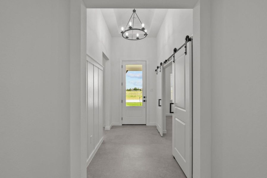 Welcoming foyer with feature wall