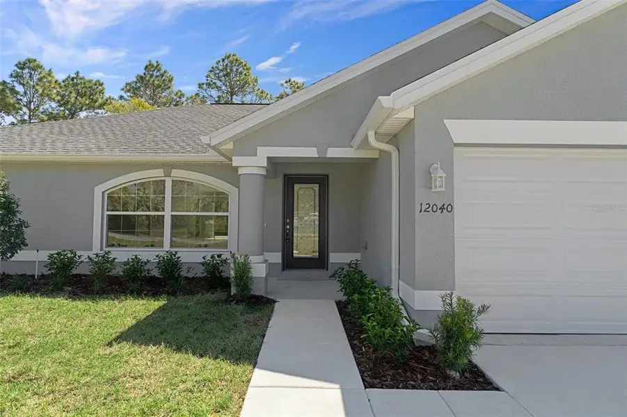 Exterior details and patio area of a home in , Brooksville (Image 3).