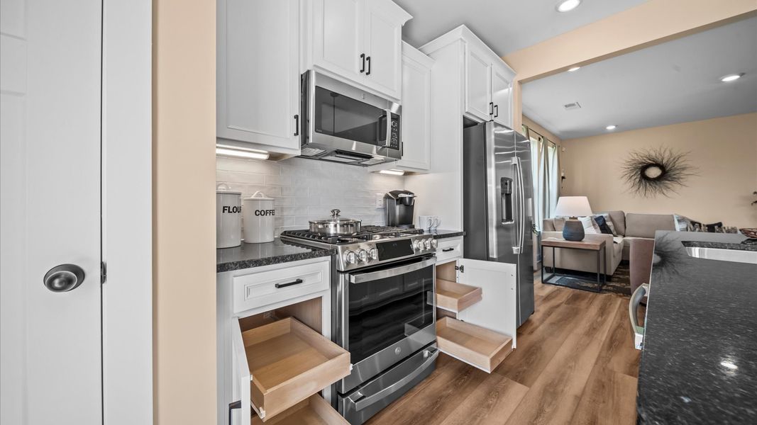 Representative furnished interior of a home built from the Corner Litchfield by DRB Homes in Gresham Station, Simpsonville (Image 11).