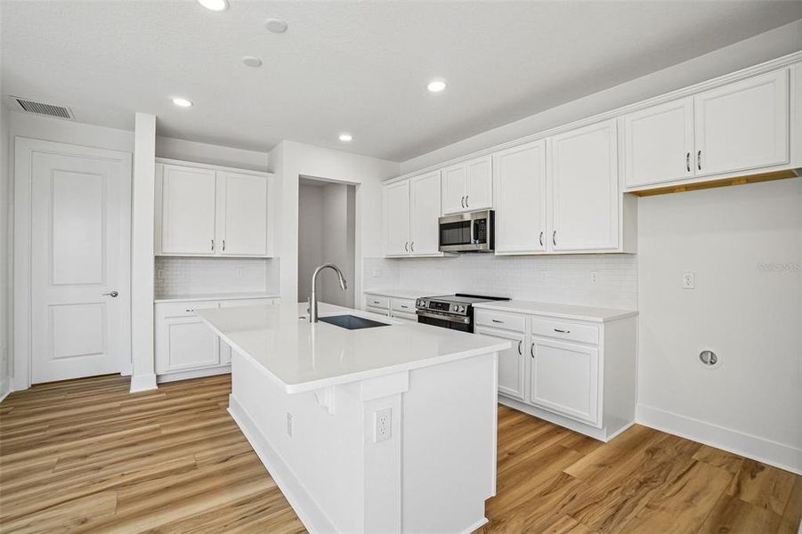 Furnished interior view inside a new home in Lagoon Residences at Epperson, Wesley Chapel (Image 7).