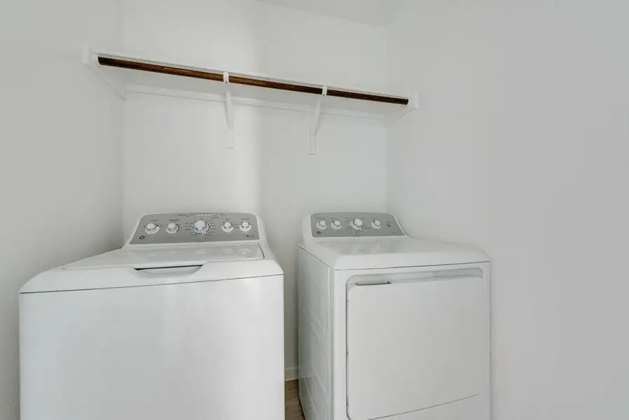 Washroom with washing machine and dryer Washroom with washing machine and dryer