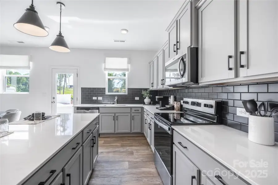 Furnished interior view inside a new home in Dukes Ridge, Charlotte (Image 10).
