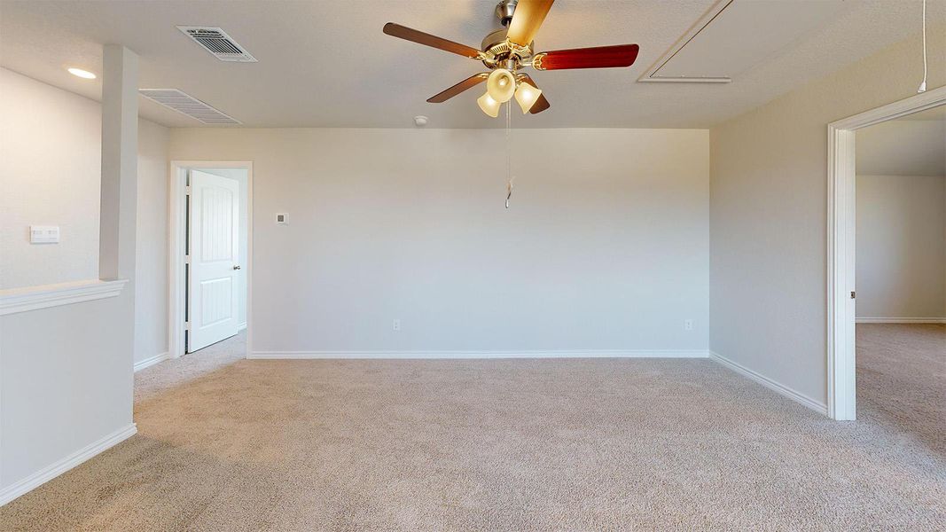 Empty room featuring a ceiling fan, light carpet, and recessed lighting Empty room featuring a ceiling fan, light carpet, and recessed lighting