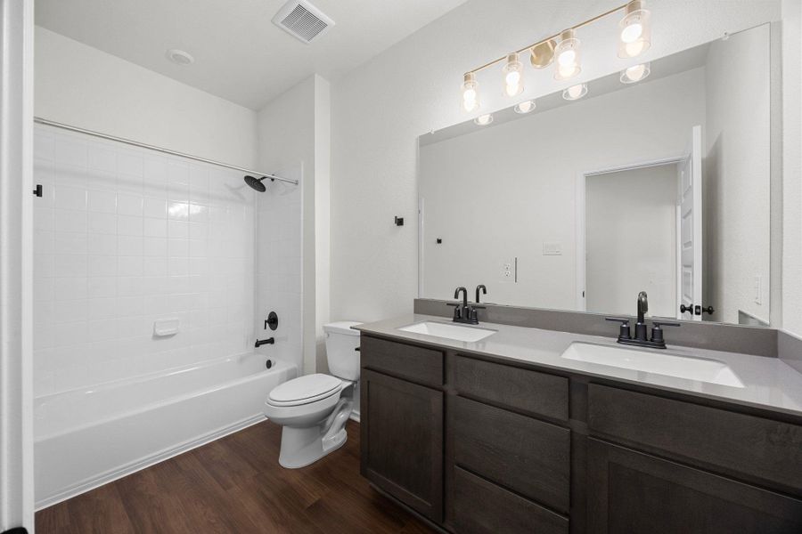 Furnished interior view inside a new home in Salerno - Classic Collection, Round Rock (Image 9).