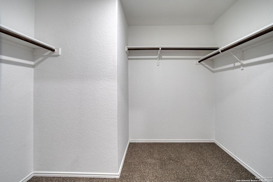 Spacious, unfurnished interior of a new home in Ruby Crossing: Cottage Collection, San Antonio (Image 12).