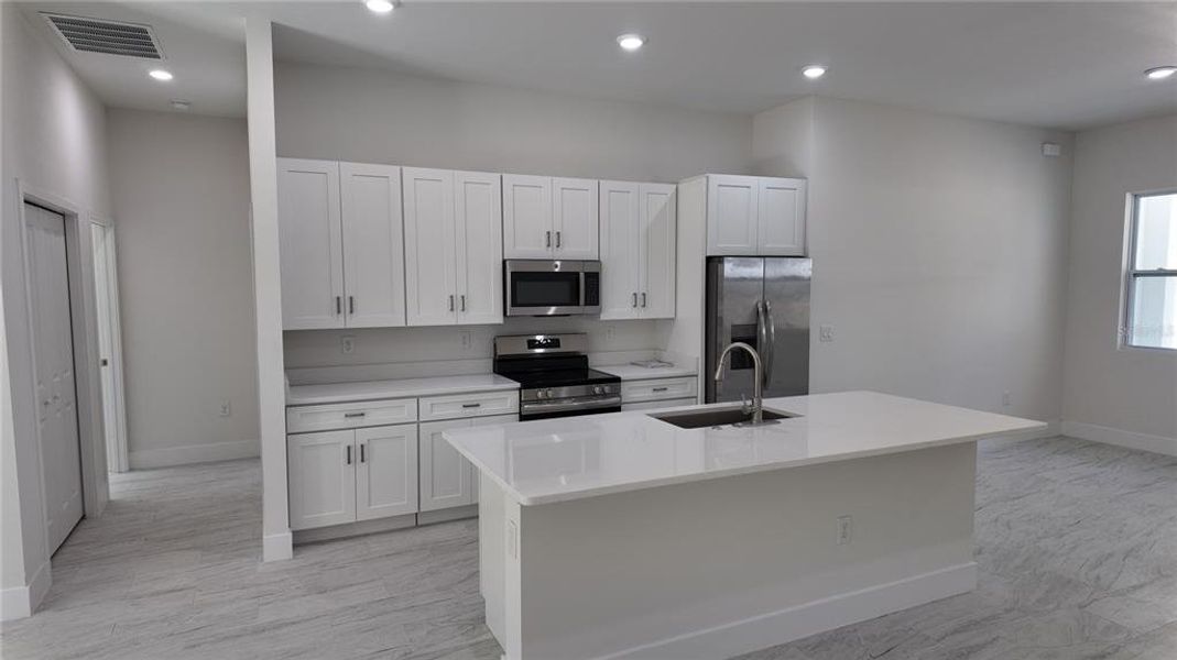 Furnished interior view inside a new home in , Dunnellon (Image 9).