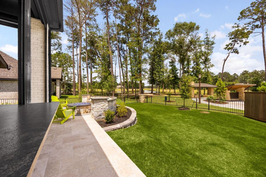 Exterior details and patio area of a home in The Highlands, Porter (Image 24).