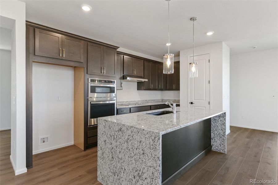 Furnished interior view inside a new home in Legato, Commerce City (Image 8).