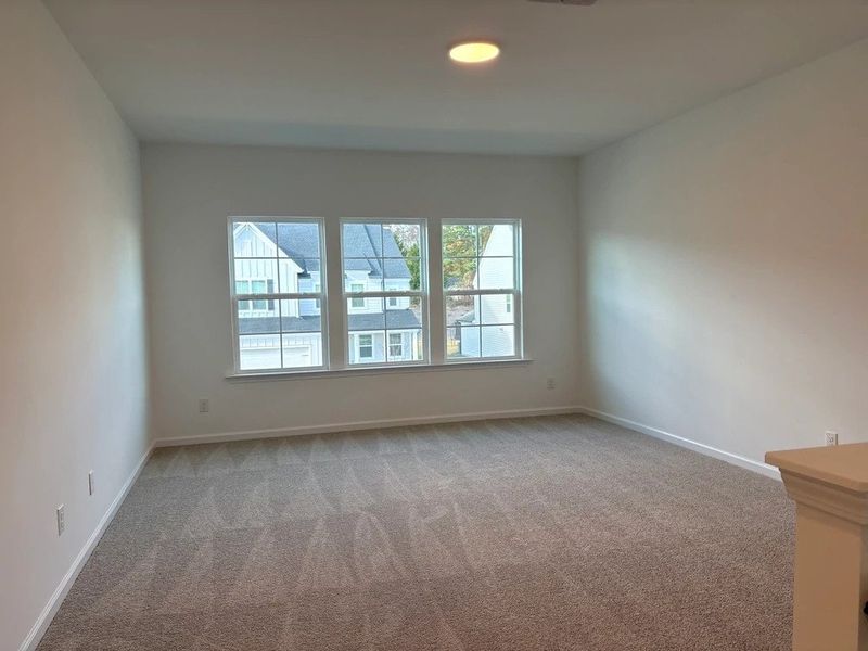 Loft featuring the AW Collection® Foundry - Open, elevated space for modern living.