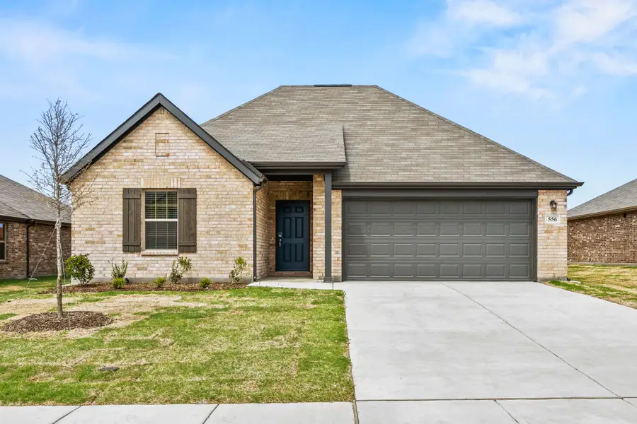 Front exterior of a new home in Rolling Ridge, Van Alstyne, TX, highlighting curb appeal (Image 1). Front exterior of a new home in Rolling Ridge, Van Alstyne, TX, highlighting curb appeal (Image 1).