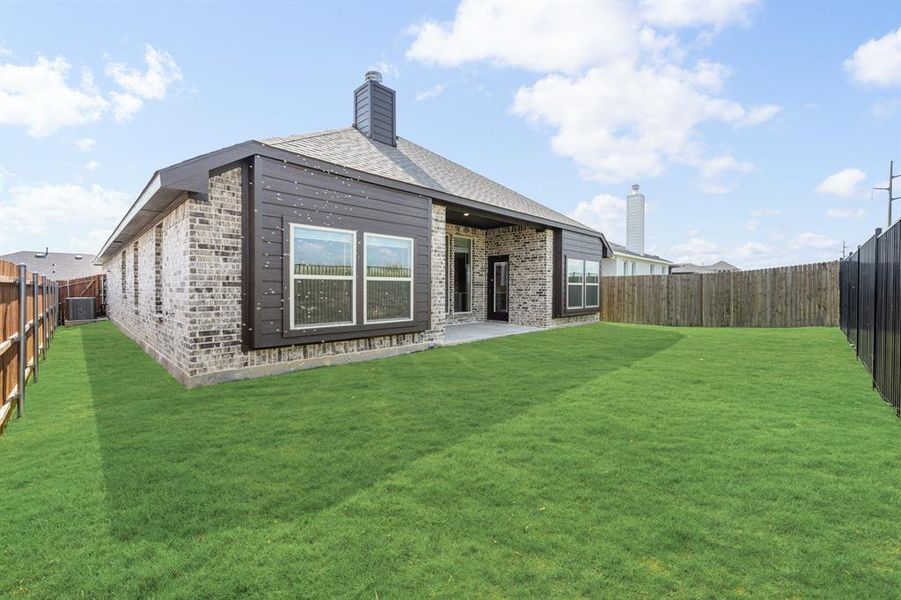 Exterior details and patio area of a home in Godley Ranch Classic, Godley (Image 24). Exterior details and patio area of a home in Godley Ranch Classic, Godley (Image 24).