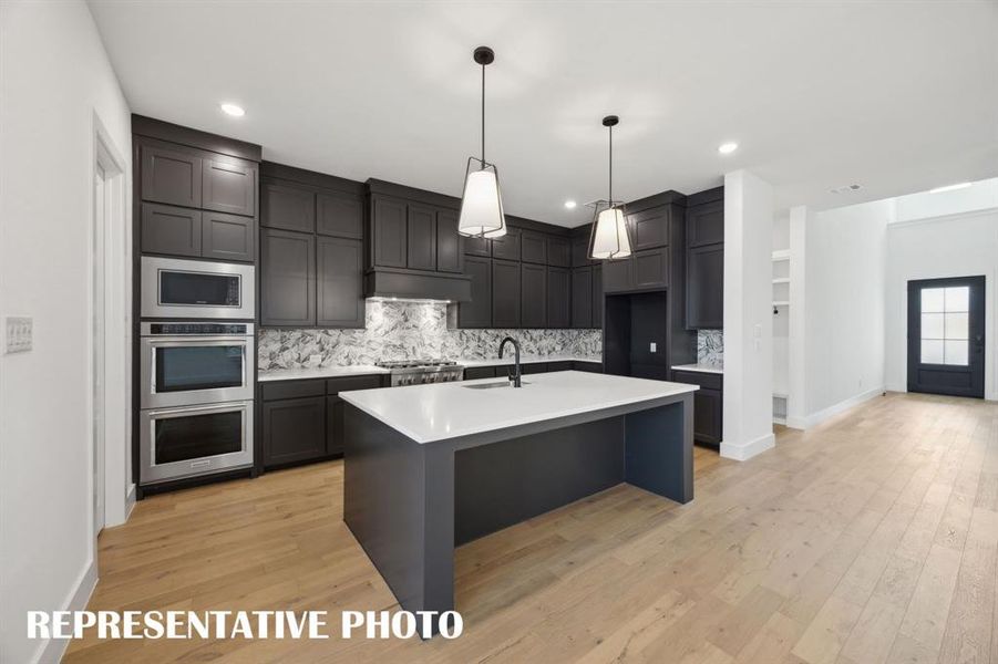 No shortage of storage, prep space or style in this dream kitchen!  REPRESENTATIVE PHOTO