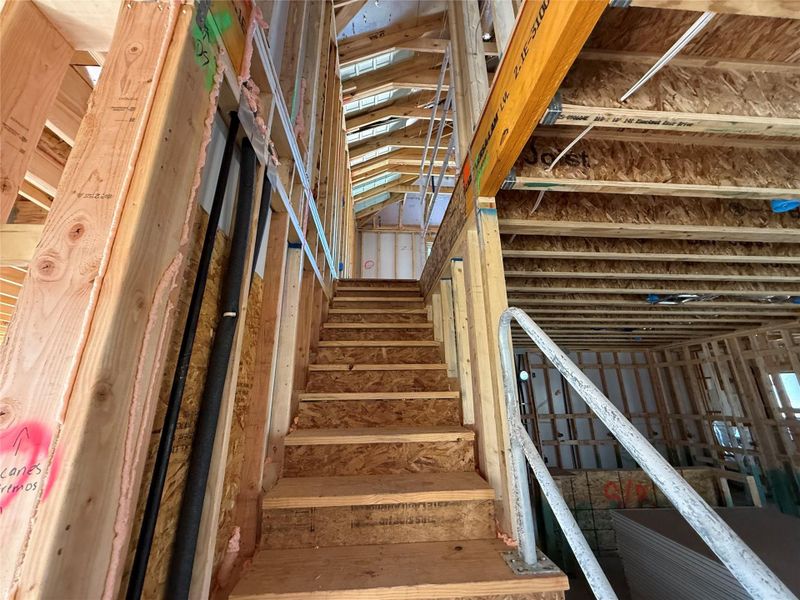 In-progress construction of a new home in The Cottages at La Cima, San Marcos, TX (Image 25).