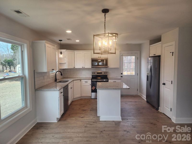 Furnished interior view inside a new home in , Statesville (Image 8).