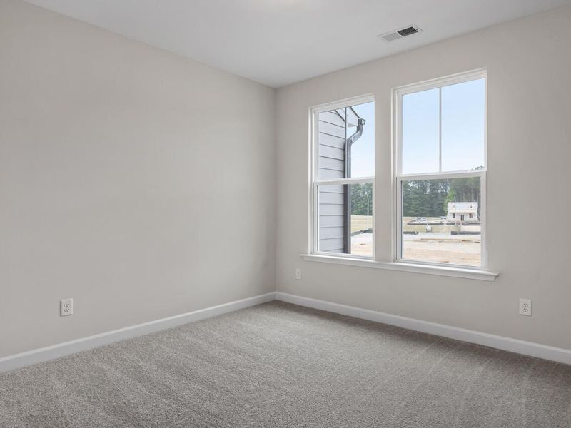 Spacious, unfurnished interior of a new home in Forestville Yard Townhomes, Knightdale (Image 11).