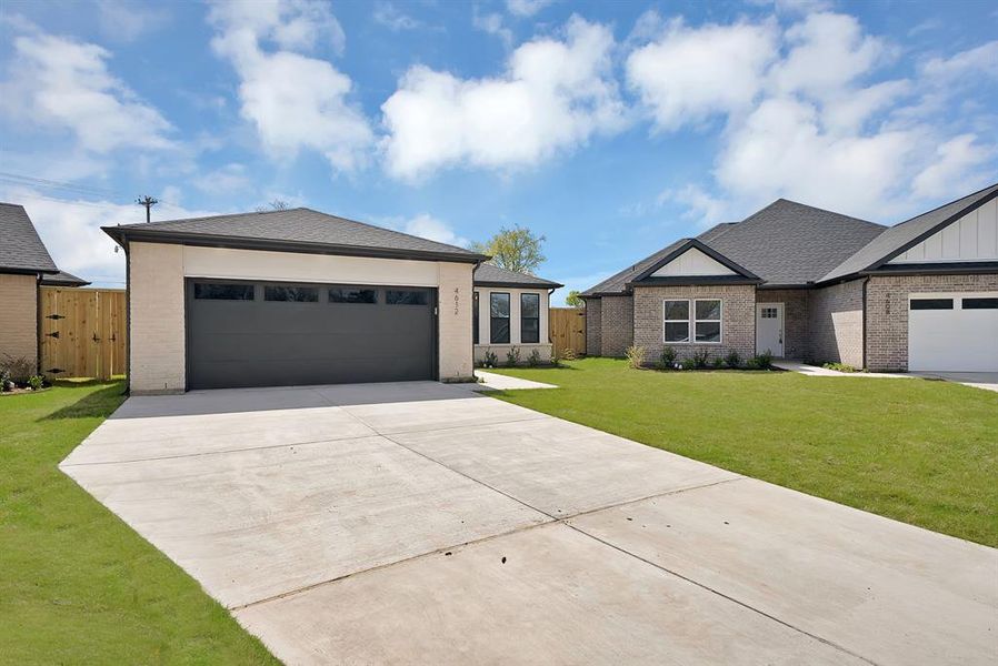 Front exterior of a new home in , The Colony, TX, highlighting curb appeal (Image 22).