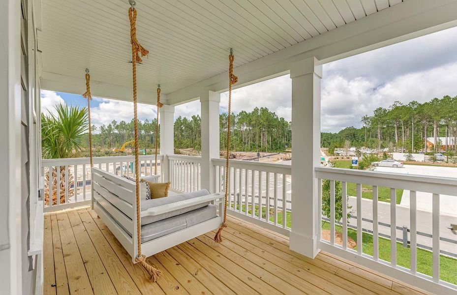 Relax on your double front porch swing!
