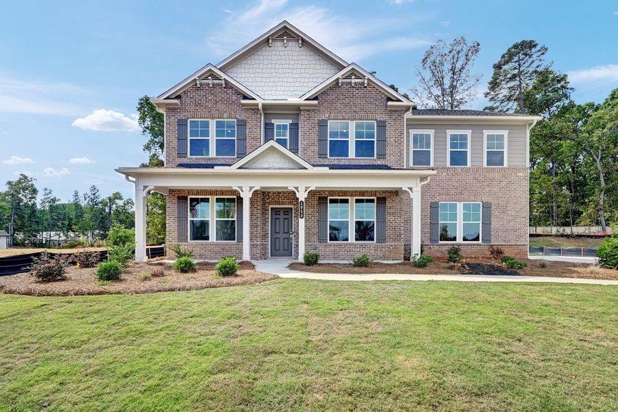 Front exterior of a new home in Watson Park, Snellville, GA, highlighting curb appeal (Image 1). Front exterior of a new home in Watson Park, Snellville, GA, highlighting curb appeal (Image 1).