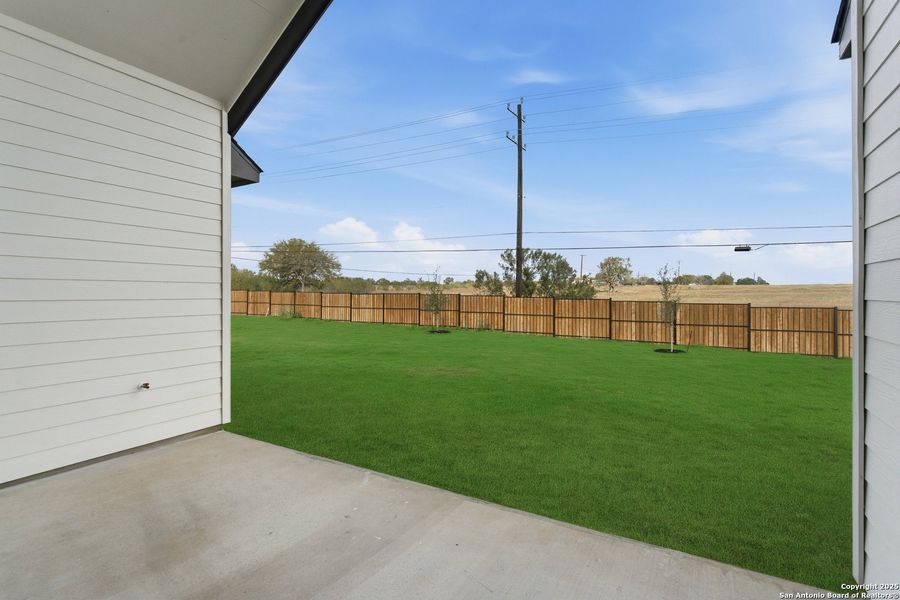 Exterior details and patio area of a home in Sienna Lakes, San Antonio (Image 3).