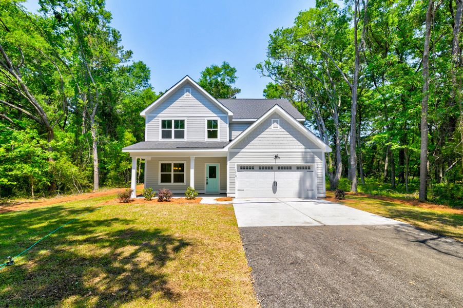 Front exterior of a new home in , Charleston, SC, highlighting curb appeal (Image 18).