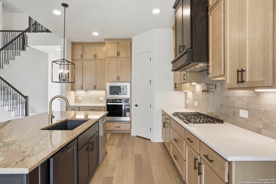 Furnished interior view inside a new home in Kinder Ranch 70's, San Antonio (Image 9).