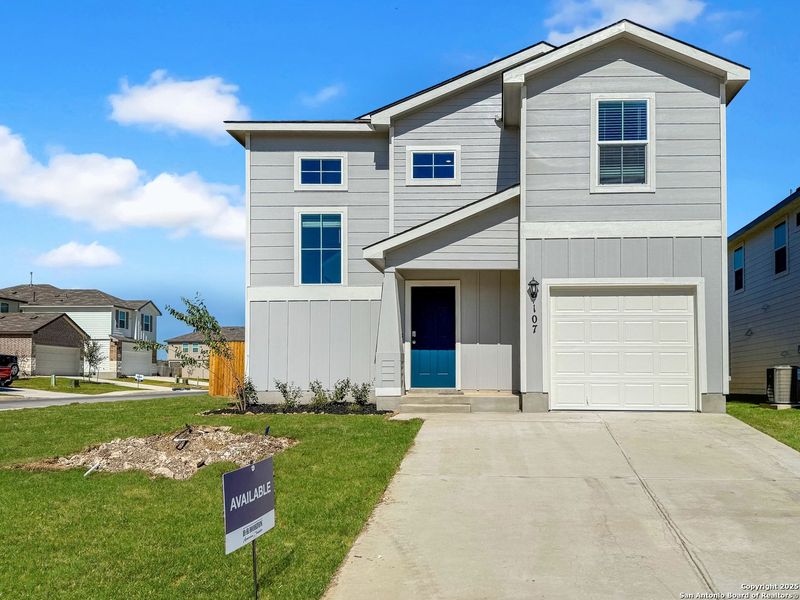Front exterior of a new home in Redbird Ranch, San Antonio, TX, highlighting curb appeal (Image 2).