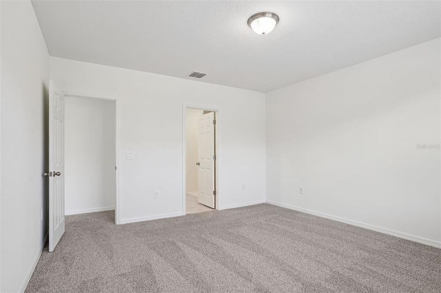 Spacious, unfurnished interior of a new home in Lake Deer Estates - Signature Series, Poinciana (Image 19). Spacious, unfurnished interior of a new home in Lake Deer Estates - Signature Series, Poinciana (Image 19).