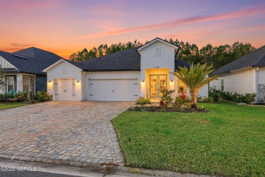 Front exterior of a new home in Silver Landing at SilverLeaf, St. Augustine, FL, highlighting curb appeal (Image 23).