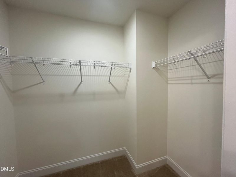 Double Walk in Closets in Primary Bath