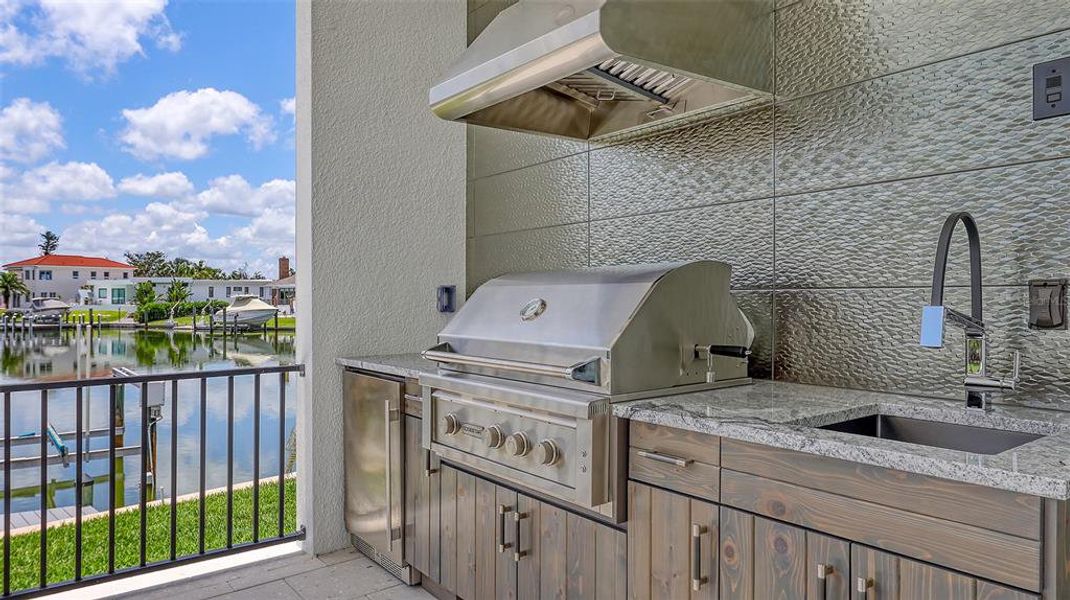Exterior details and patio area of a home in , Longboat Key (Image 34).