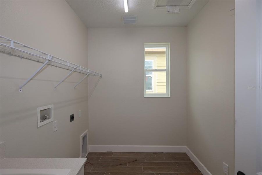 Spacious, unfurnished interior of a new home in Lake Star at Ovation, Winter Garden (Image 6).