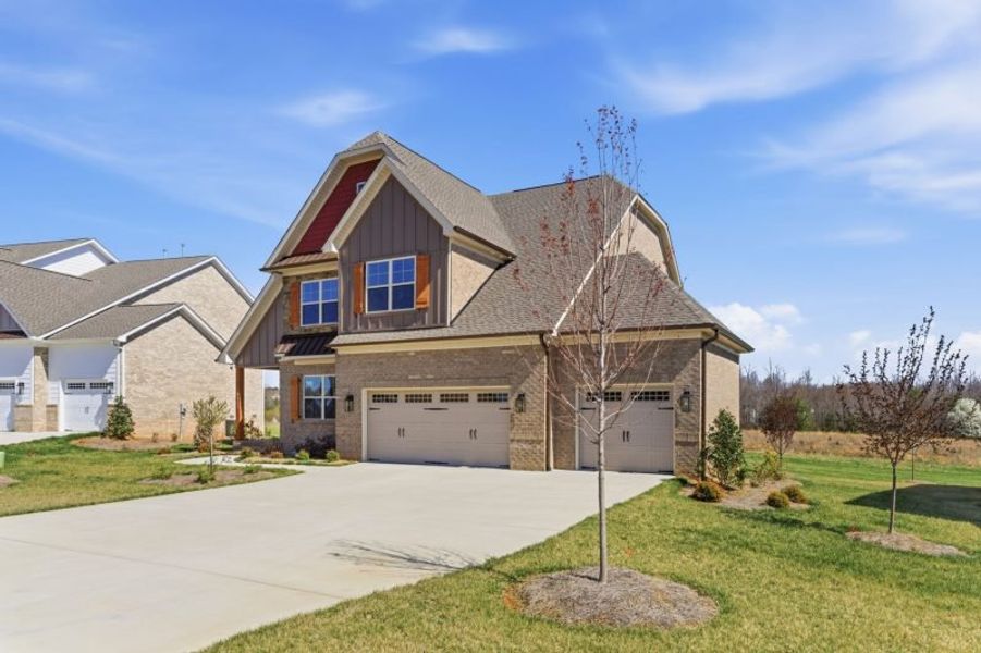 Representative exterior photo of a completed home built from the Hampton by Keystone Homes NC in Preserve at Carriage Cove, Oak Ridge, NC (Image 38).