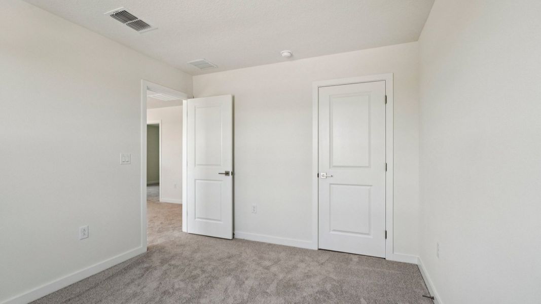 Secondary Bedroom located in the Jupiter in Hamilton Bluff located in Haines City, FL.