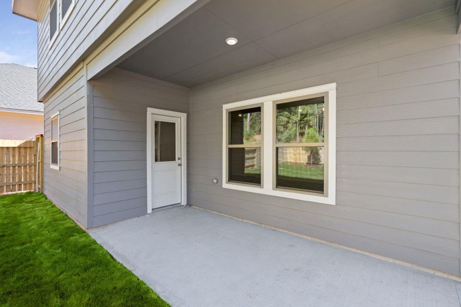 Exterior details and patio area of a home in Westridge Cove, Panorama Village (Image 3).