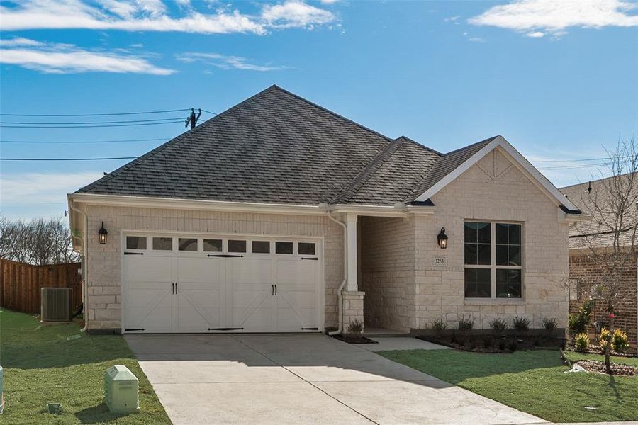 Front exterior of a new home in Villages of Hurricane Creek, Anna, TX, highlighting curb appeal (Image 2). Front exterior of a new home in Villages of Hurricane Creek, Anna, TX, highlighting curb appeal (Image 2).