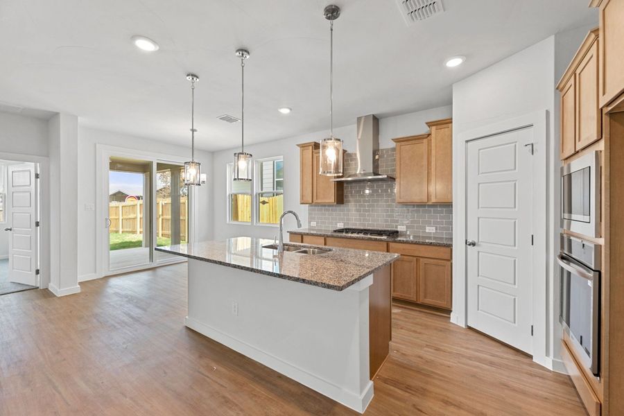Representative furnished interior of a home built from the Sabrine by Hakes Brothers in Highland Ridge, New Braunfels (Image 15).