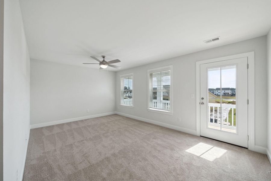 Spacious, unfurnished interior of a new home in Tidewater at Lakes of Cane Bay, Summerville (Image 30).