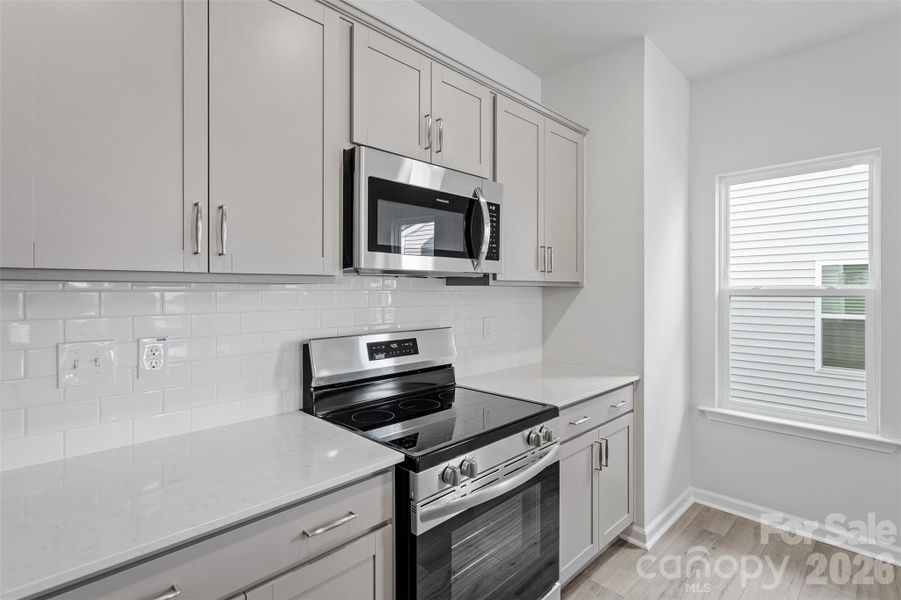 Furnished interior view inside a new home in Sloan Station, Charlotte (Image 7).