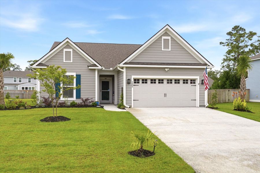 Front exterior of a new home in , Johns Island, SC, highlighting curb appeal (Image 23). Front exterior of a new home in , Johns Island, SC, highlighting curb appeal (Image 23).