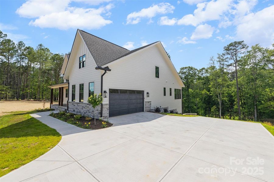 Front exterior of a new home in , Clover, SC, highlighting curb appeal (Image 1).