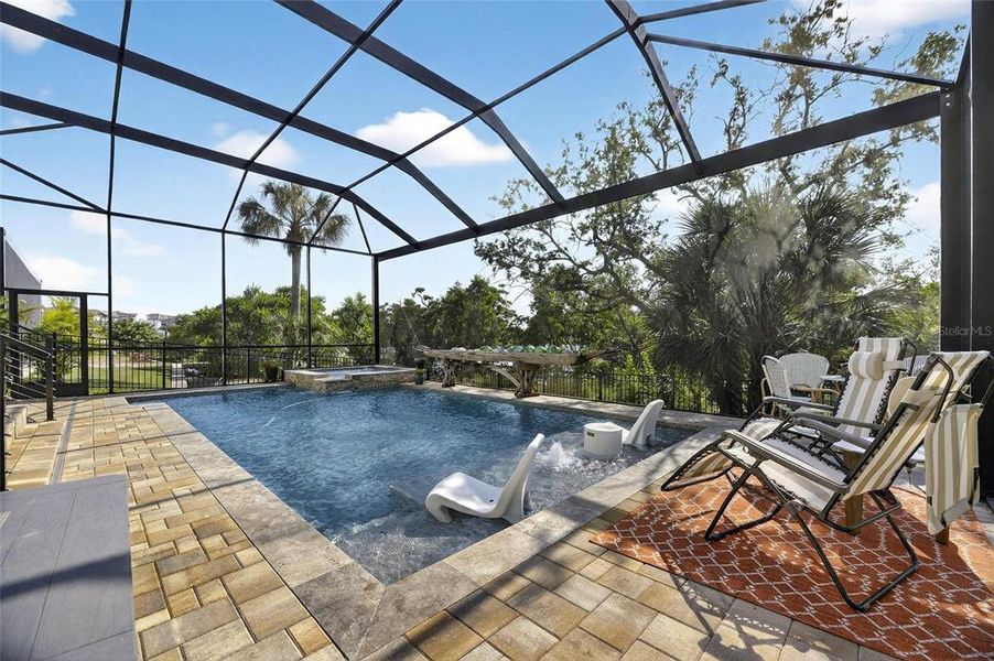 Exterior details and patio area of a home in SouthShore Yacht Club: Somerset Preserve, Ruskin (Image 34).