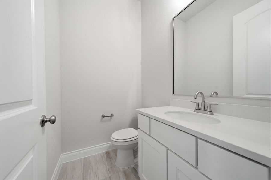 Furnished interior view inside a new home in The Woodlands Hills 65′, Willis (Image 19).