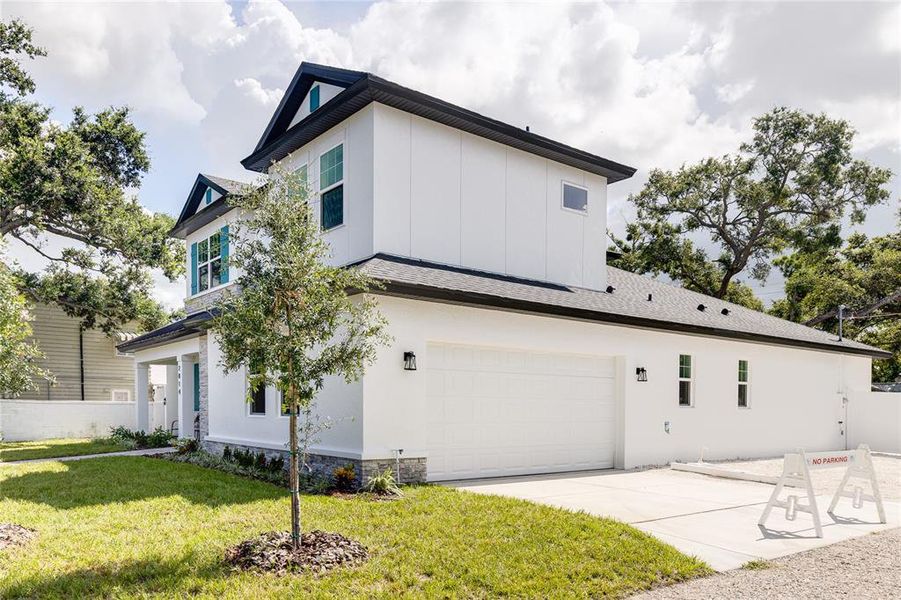 Front exterior of a new home in , Gulfport, FL, highlighting curb appeal (Image 25). Front exterior of a new home in , Gulfport, FL, highlighting curb appeal (Image 25).