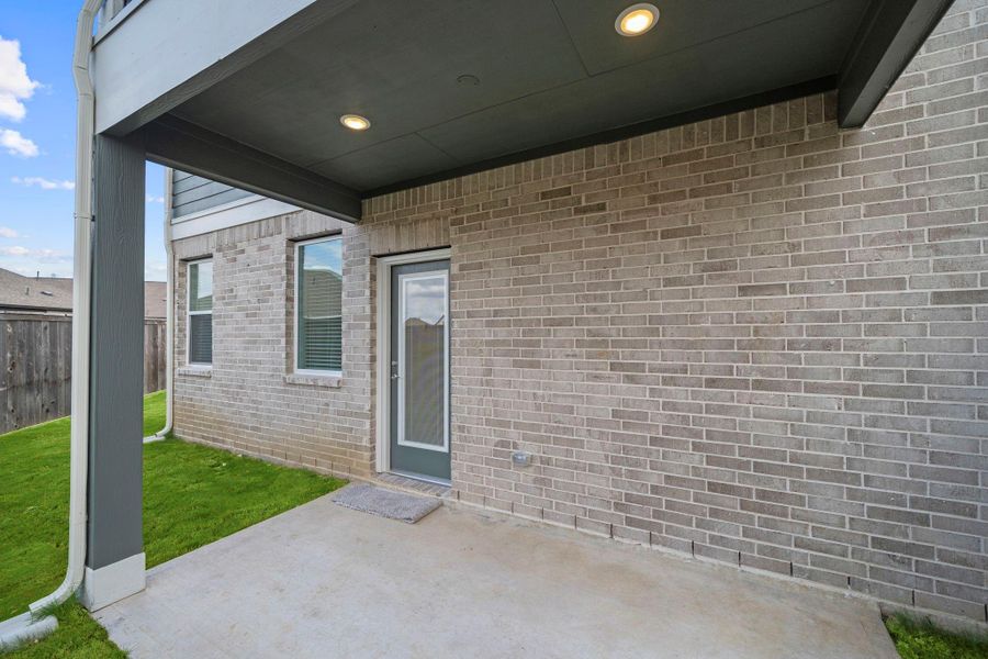 Exterior details and patio area of a home in Bridgeland, Cypress (Image 20). Exterior details and patio area of a home in Bridgeland, Cypress (Image 20).