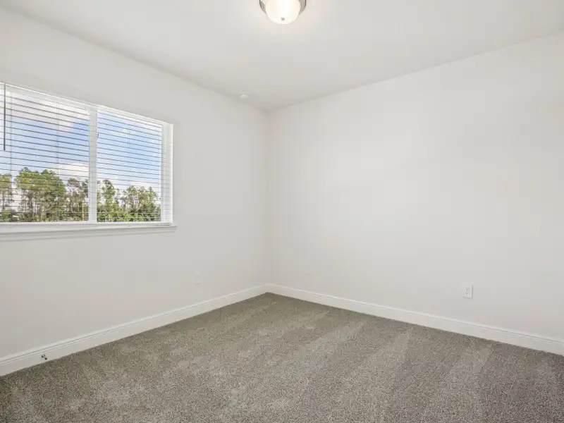 Spacious, unfurnished interior of a new home in Cyrene at Minneola - Villas, Minneola (Image 12).