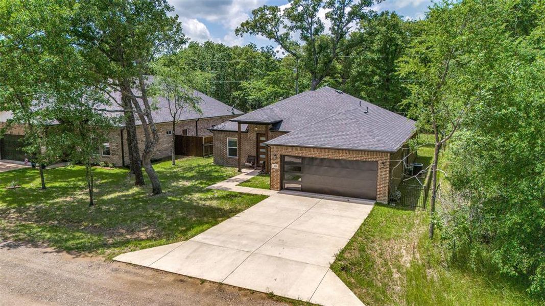 View of front of house with front facing 2 car garage. View of front of house with front facing 2 car garage.
