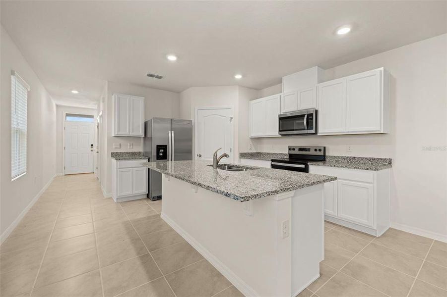 Furnished interior view inside a new home in , Kissimmee (Image 13). Furnished interior view inside a new home in , Kissimmee (Image 13).