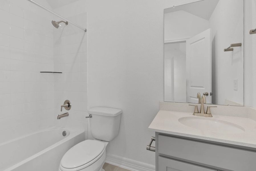 Furnished interior view inside a new home in Westland Ranch, League City (Image 11).