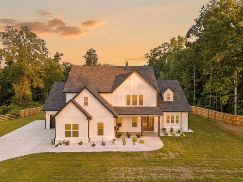 Front exterior of a new home in , Bethlehem, GA, highlighting curb appeal (Image 33).